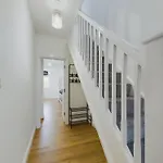 Sleek 6-Bed Townhouse With Garden