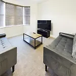 Sleek 6-Bed Townhouse With Garden